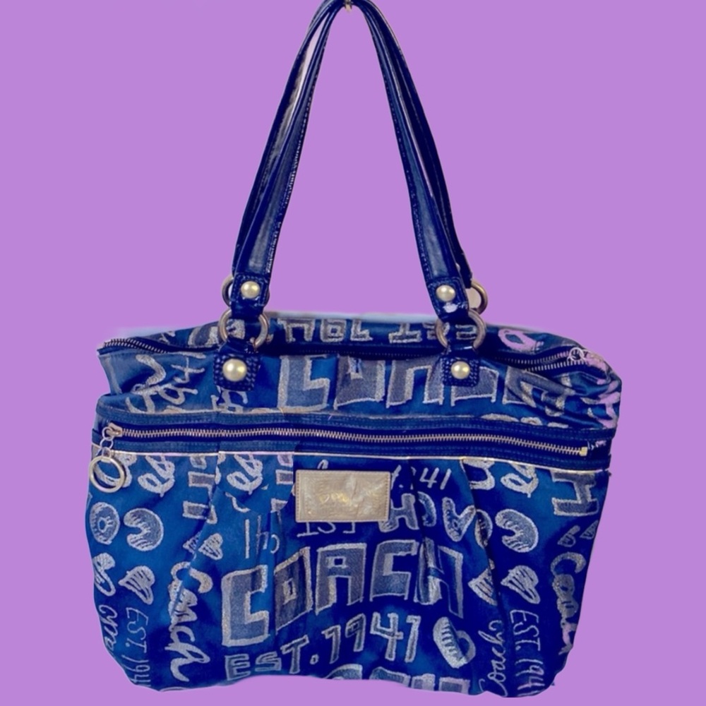 Lost in the 🔥 
Coach Poppy Navy Story Patch Tote